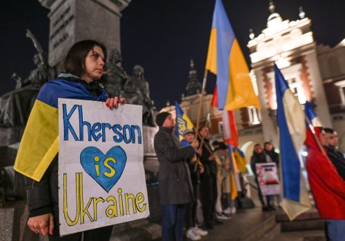 Ukrainians people living in Krakow and their supporters are seen during the Solidarity With Ukraine protest in Krakow's Main Square, on the 232nd day of the Russian invasion of Ukraine.