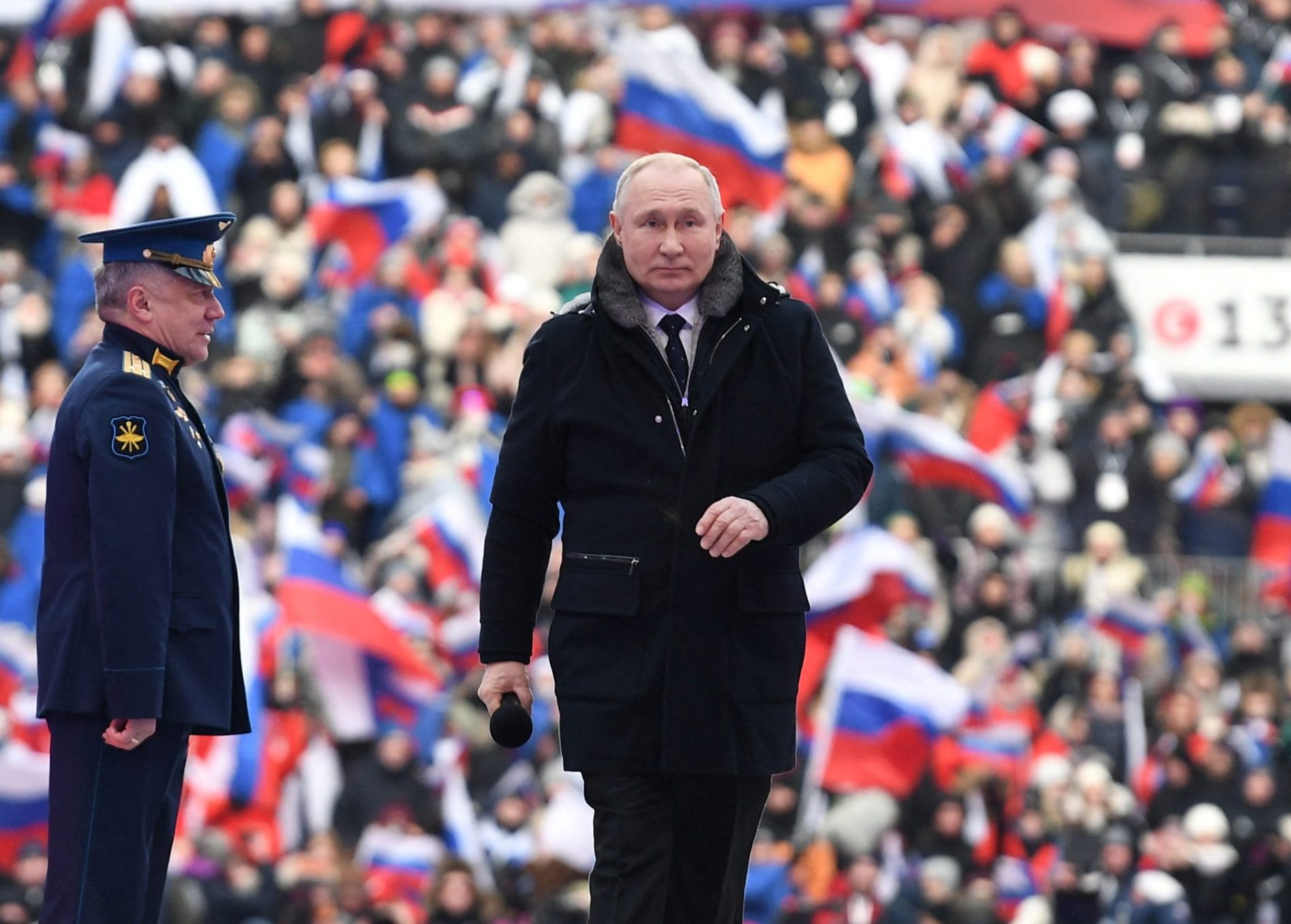 Putin appears at big rally as troops press attack in Ukraine