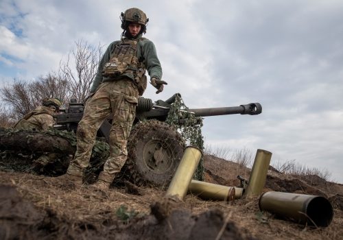 Ukrainian service members from a battalion, named of nom-de-guerre of their commander 'Da Vinci', Hero of Ukraine, who was killed in a fight against Russian troops, fire a howitzer M119 at a front line, amid Russia's attack on Ukraine, near the city of Bakhmut, Ukraine March 10, 2023. REUTERS/Oleksandr Ratushniak bakhmut