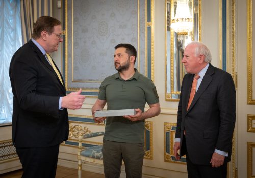 Atlantic Council President and CEO Fred Kempe speaks to Ukrainian President Volodymyr Zelenskyy with Atlantic Council Chairman John F. W. Rogers