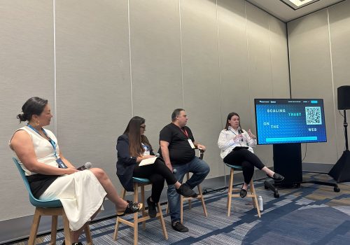 Task Force Director Kat Duffy moderates a panel featuring Task Force members Alex Feerst, Nighat Dad, and Sarah Oh at TrustCon 2023 in San Francisco.