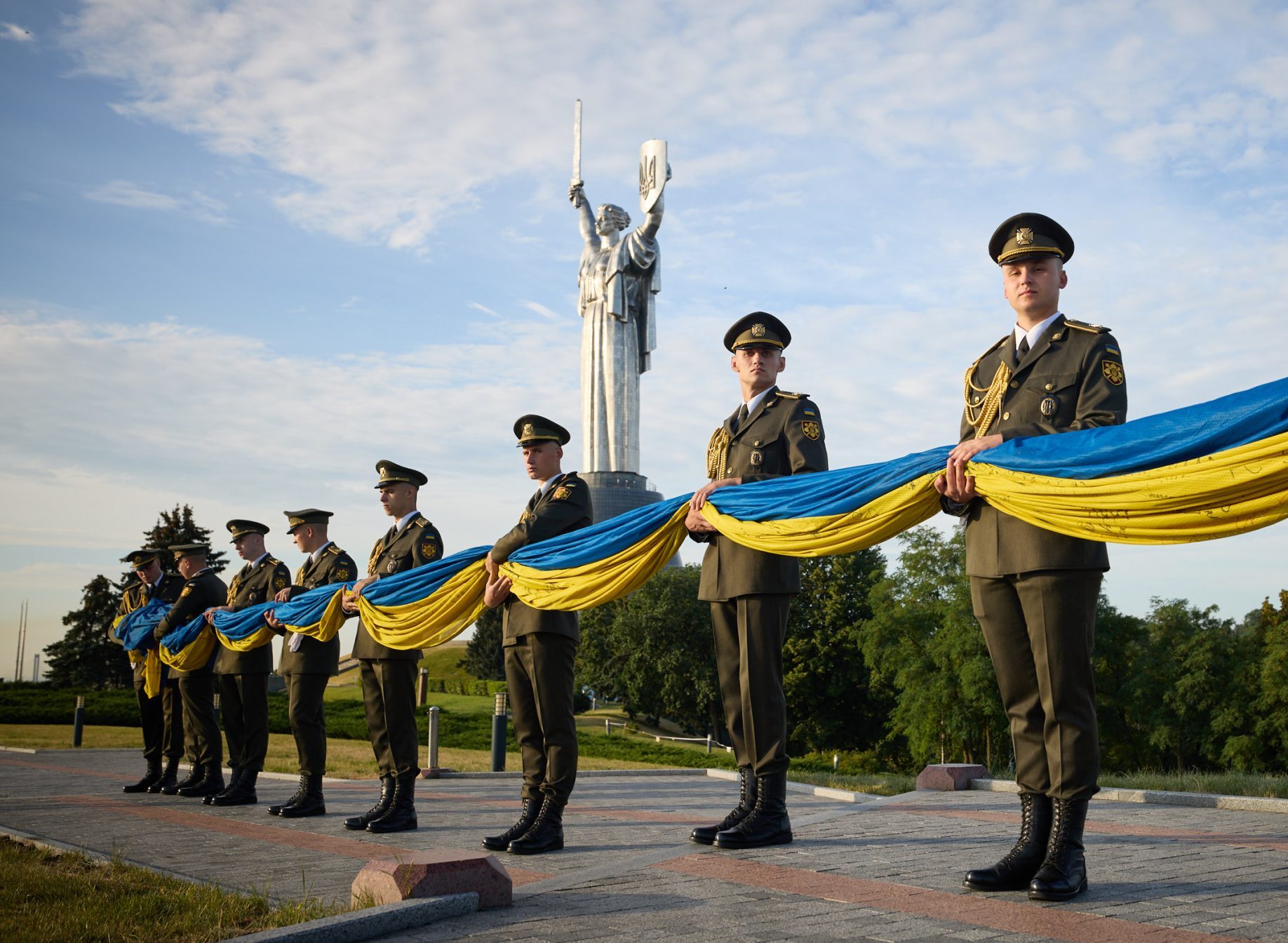 russian soldier war hero with a flag against the