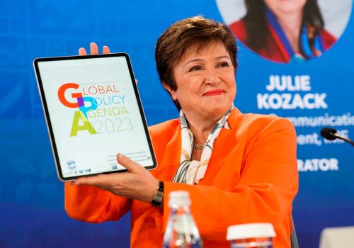 International Monetary Fund (IMF) Managing Director Kristalina Georgieva holds up a logo for the 2023 global policy agenda at the start of a news conference during the 2023 Spring Meetings of the World Bank Group and the International Monetary Fund in Washington, U.S., April 13, 2023. REUTERS/Elizabeth Frantz