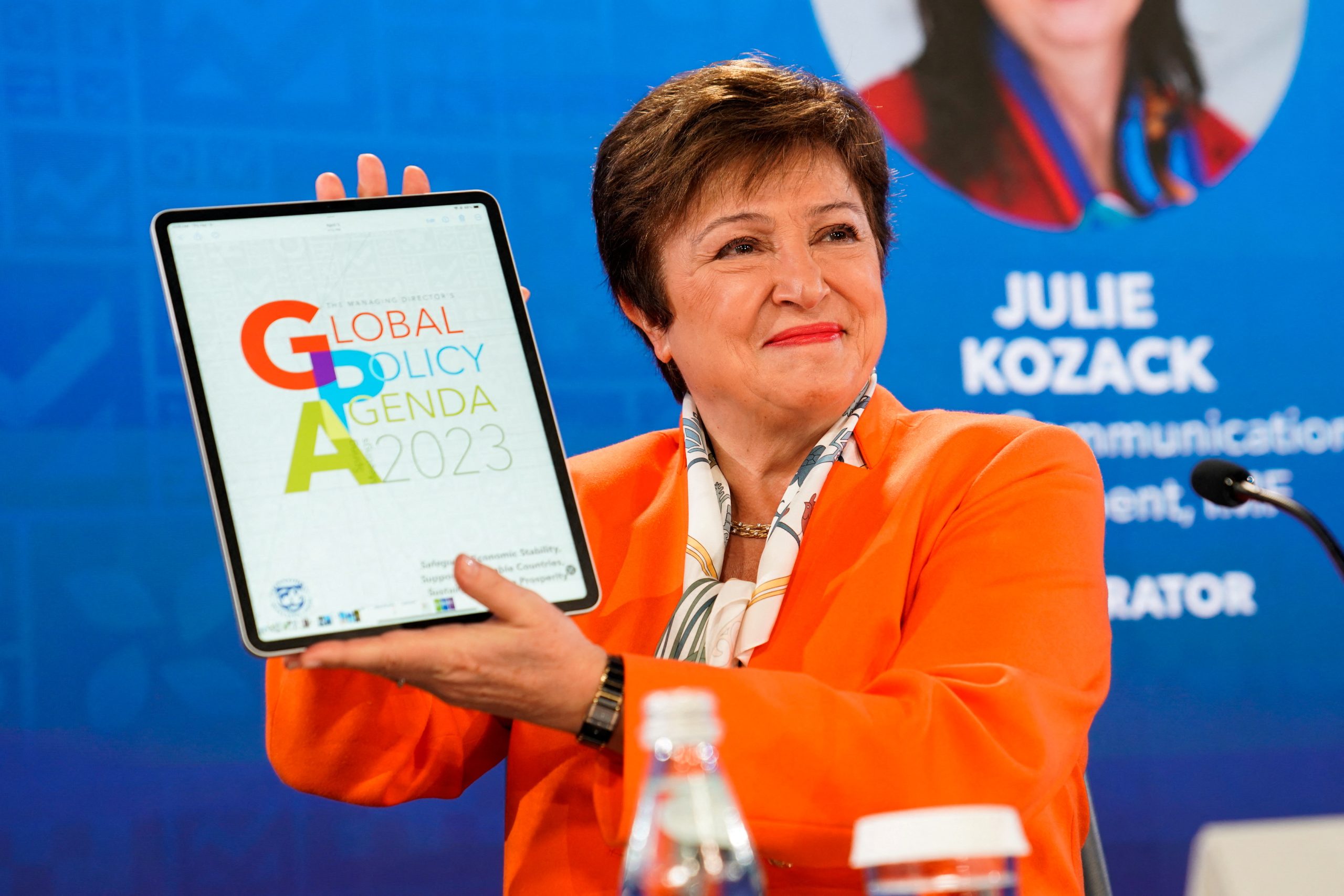 International Monetary Fund (IMF) Managing Director Kristalina Georgieva holds up a logo for the 2023 global policy agenda at the start of a news conference during the 2023 Spring Meetings of the World Bank Group and the International Monetary Fund in Washington, U.S., April 13, 2023. REUTERS/Elizabeth Frantz