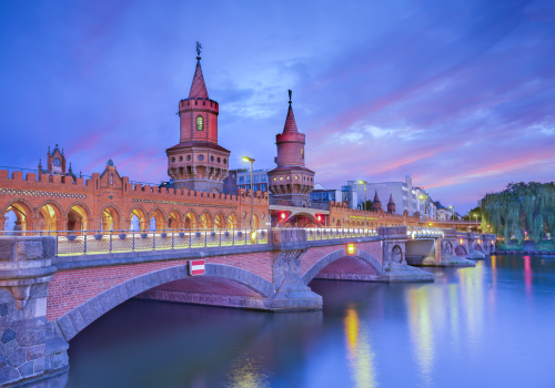 Image of the Oberbaum Bridge in Berlin, during a dramatic sunset. RudyBalasko via IStock