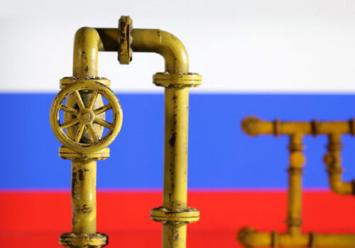 Model of natural gas pipeline and Russian flag, July 18, 2022. REUTERS/Dado Ruvic/Illustration