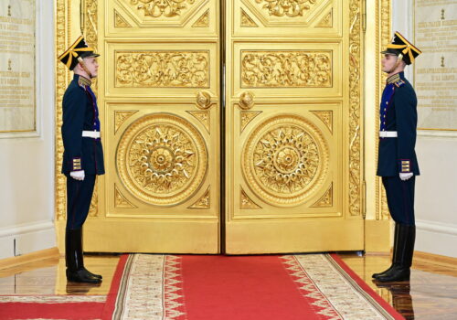 Kremlin honor guard waits to open doors