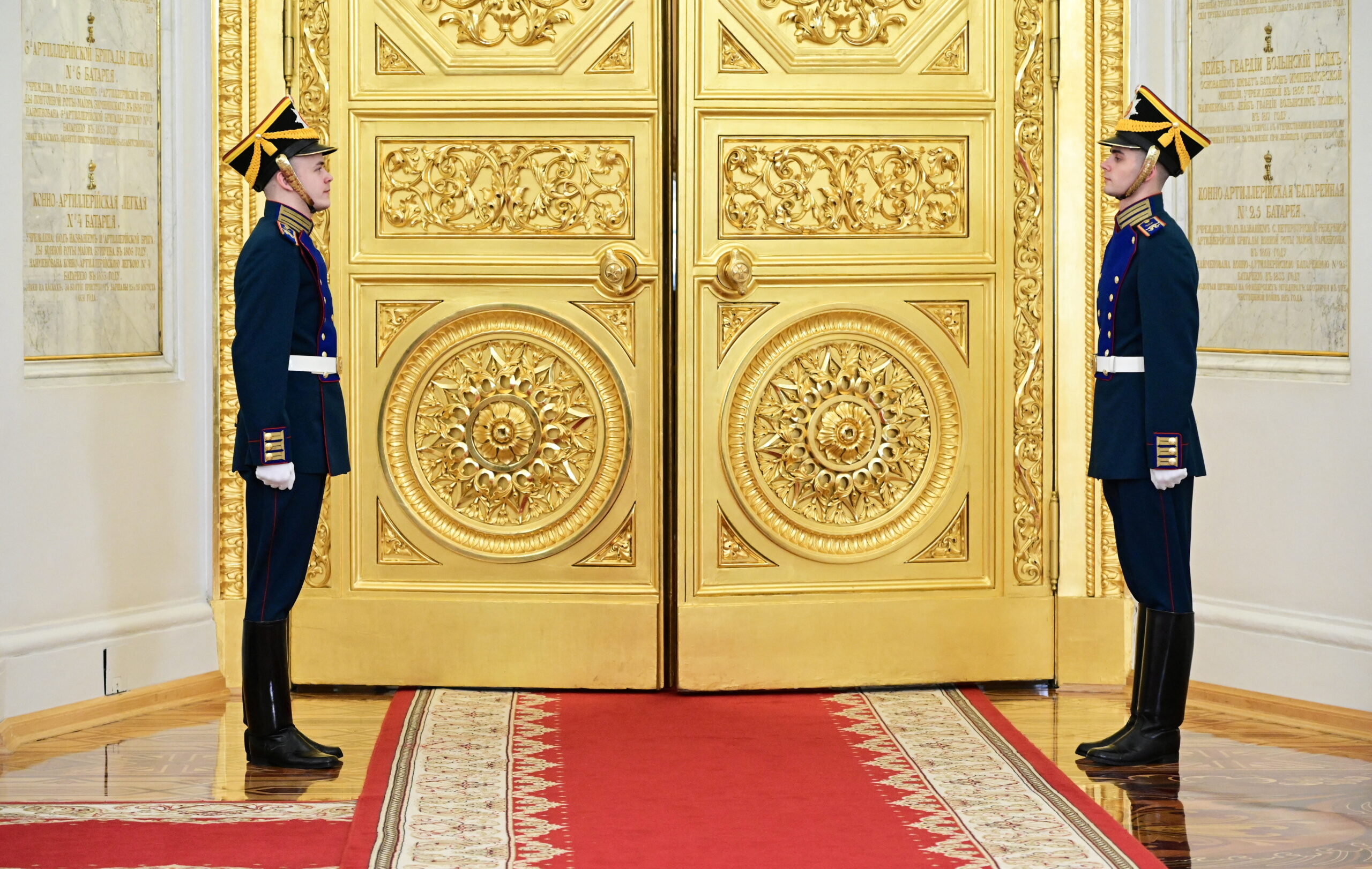 Kremlin honor guard waits to open doors