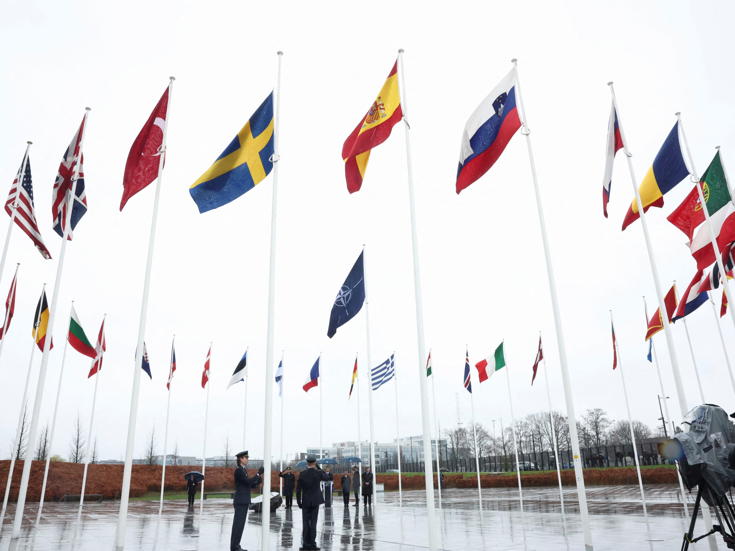 A Swedish flag is raised during a flag-raising ceremony at NATO headquarters following the accession of Sweden to the alliance, in Brussels, Belgium March 11, 2024. REUTERS/Yves Herman