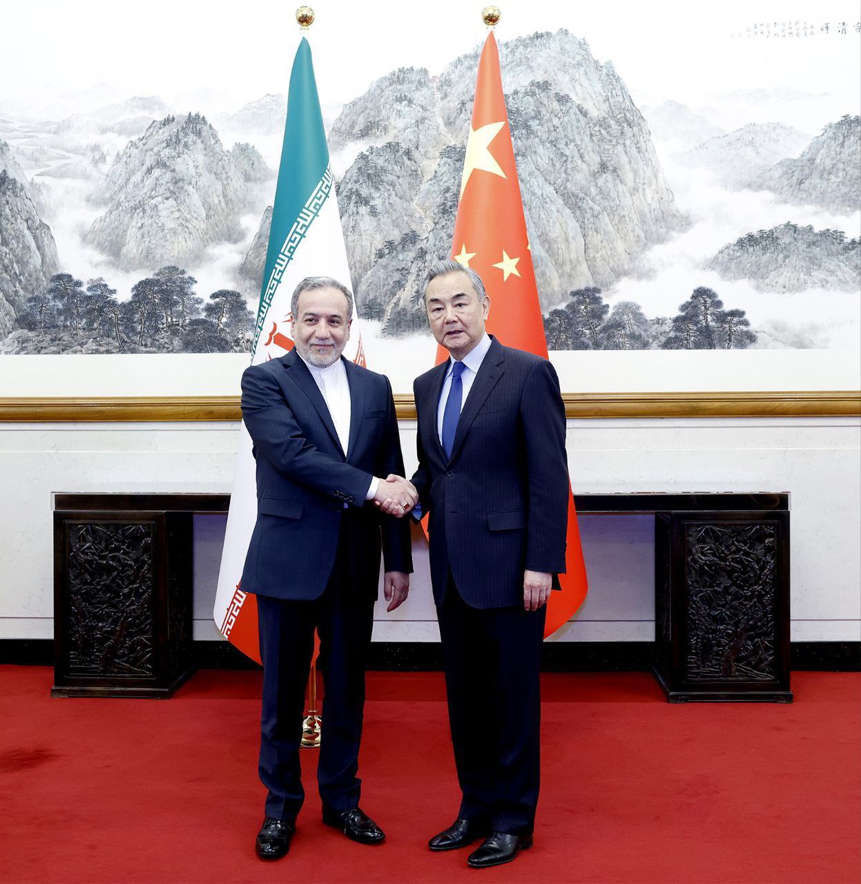 April 23, 2025, Beijing, China: Chinese Foreign Minister WANG YI (R), also a member of the Communist Party Political Bureau, meets with Iranian Foreign Minister ABBAS ARAGHCHI (L) in Beijing. Araghchi is visiting China to meet with a Chinese official regarding talks between Iran and the U.S. (Credit: Iranian Foreign Ministry via ZUMA Press Wire)