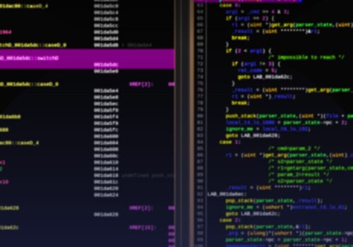Blurred photo of a malware sample in the Ghidra reverse engineering