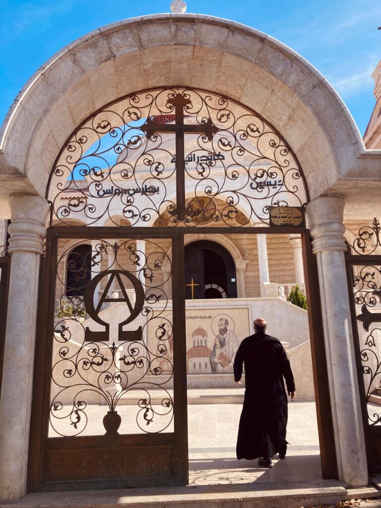 Father Dimitri at Suqaylabiyah's Church of Saint Peter and Paul in May. Photo Credit: Gregory Waters