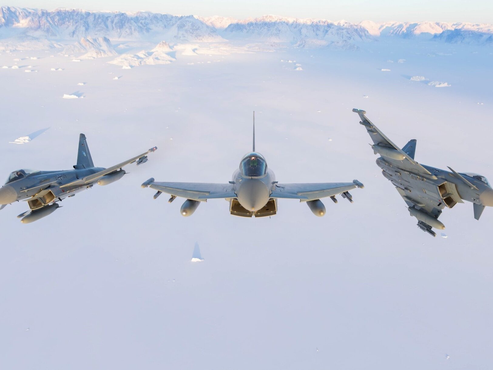 Cover Credit: NATO. German Air Force Eurofighter Typhoons fly over a remote stretch of Iceland while training with the Swedish Air Force as part of NATO’s Arctic Sentry activity. Arctic Sentry is a NATO vigilance activity aimed at enhancing security in the north, helping to make the Alliance safer. As part of this initiative, Sweden deployed a detachment of six Gripens to Keflavik Air Base to safeguard Icelandic airspace against threats or intrusions. Their deployment is also part of NATO’s Iceland Air Policing mission, marking the first time Sweden has led an air policing mission since joining NATO two years ago as its 32nd member. During their deployment, fighters from the Royal Danish Air Force and the German Air Force joined them for integration training. Situated in the middle of the North Atlantic, Iceland plays a vital role in helping Allies maintain situational awareness in the High North. Photo courtesy of the German Air Force.