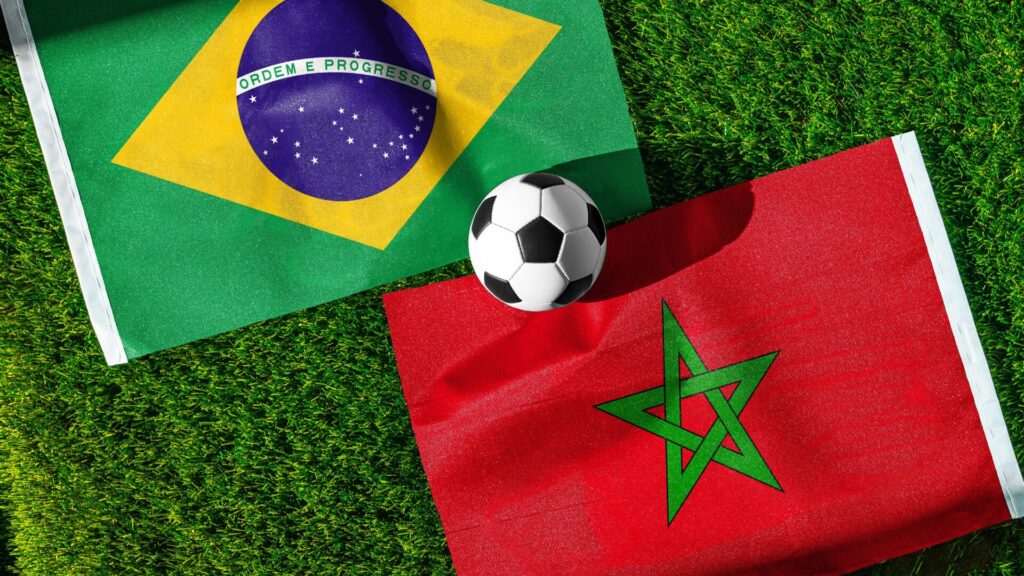 Brazil vs Morocco, national flags before world championship Group C group stage match, football on green pitch with goal in the background, East Rutherford, USA, June 13, 2026