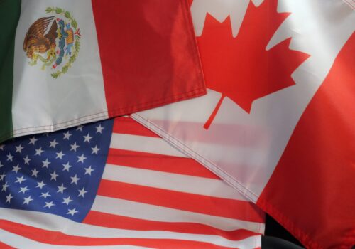 The flags of Canada, the United States, and Mexico