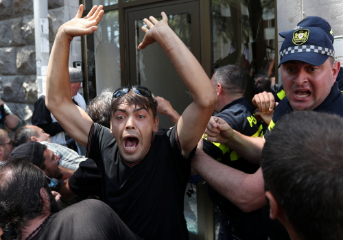 Anti-LGBT protesters storm the office of LGBT campaigners ahead of the planned March for Dignity during Pride Week in Tbilisi, Georgia, July 5, 2021. The far-right group Alt-Info actively encouraged its supporters to protest Tbilisi Pride Week.