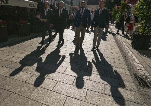 Polish MP Grzegorz Braun, second from the left, at the launch of a political initiative in Rzeszow, Poland, July 25, 2022. Braun’s Twitter account was among a handful of authentic accounts that sought to amplify the #StopUkrainizacjiPolski hashtag, which reached Poland’s Trending list largely through inauthentic amplification. (Source: Reuters, Artur Widak/NurPhoto)