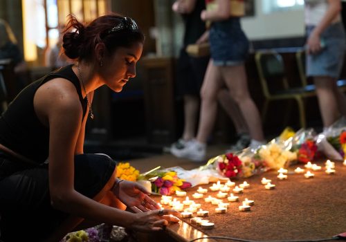People attend a vigil at St Peter's church in Nottingham, UK after three people were killed in the city center, June 13, 2023. (Source: Reuters)