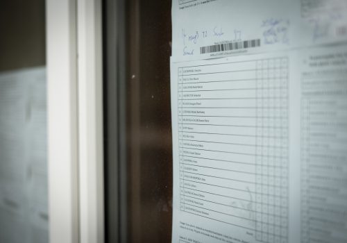 Documents showing vote counts received at a polling station are seen in Warsaw, Poland on 19 October, 2023. (Source: Jaap Arriens/NurPhoto via Reuters)